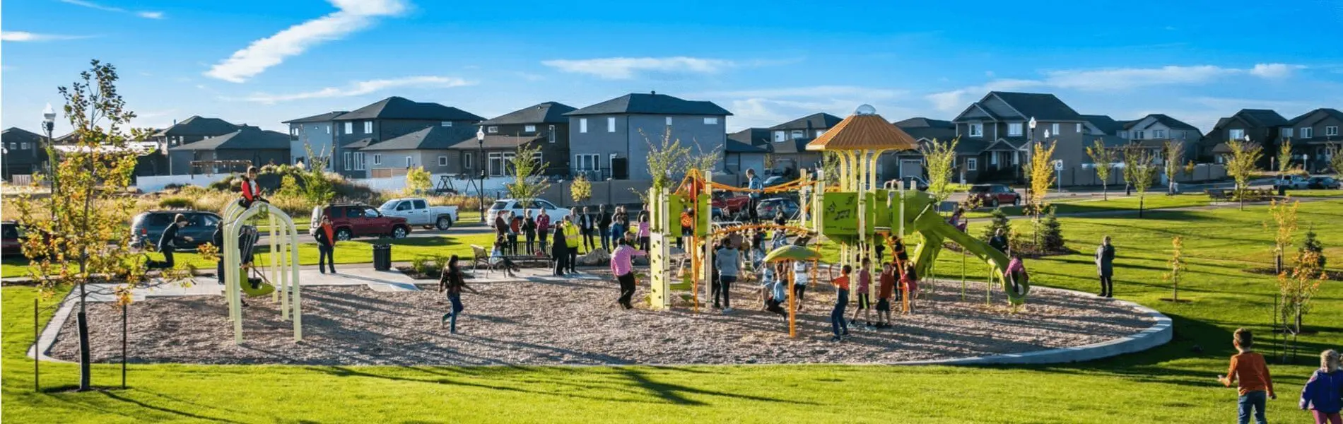 Modern homes backing the environmental reserve and green spaces in The Greens on Gardiner, Regina